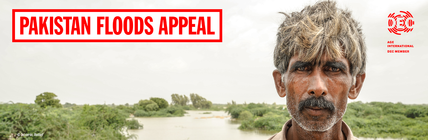 Pakistan Floods Appeal: An older man and young children affected by flooding in Pakistan.