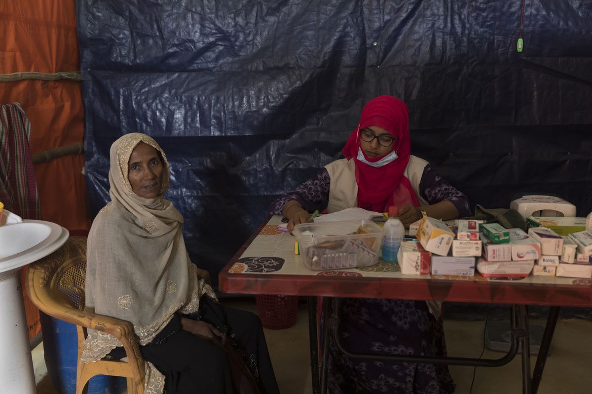 An older Rohingya refugee has a medical check  in Age International's Age Friendly Space in Bangladesh