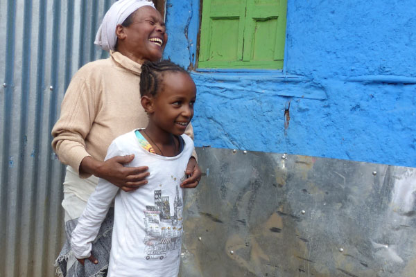 Grandmother Aselefech with the granddaughter she cares for in Ethiopia